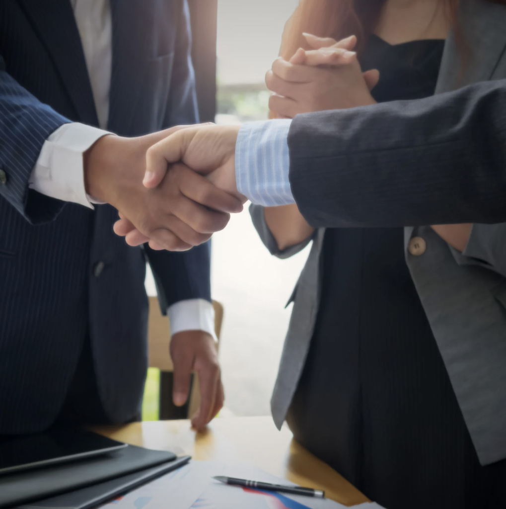 people shaking hands